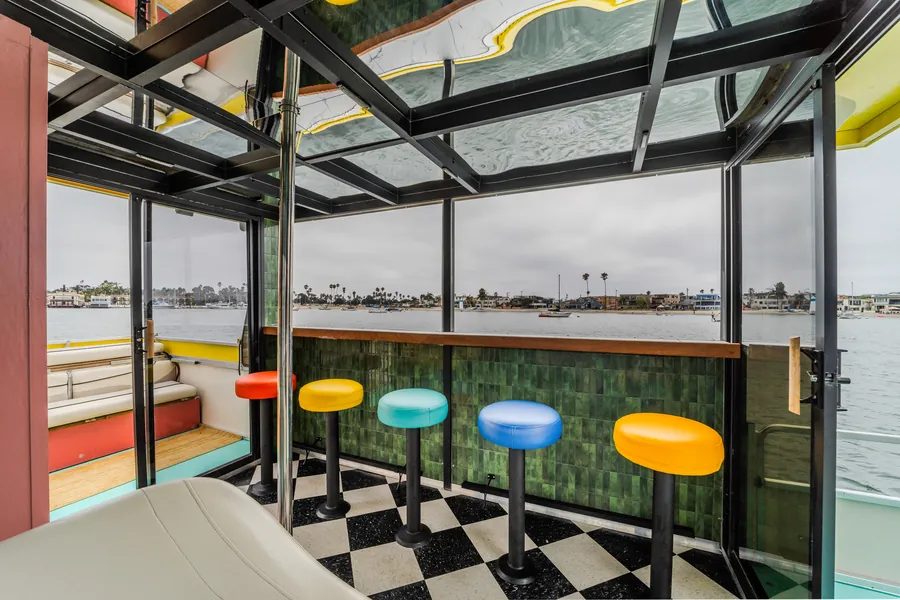Disco Boat interior detail — checkerboard flooring and mirrored ceiling panels